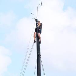 A hairy job, working at the top of a mast