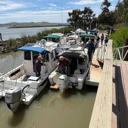 All 11 C-Dorys now docked and rafted at the Duck Club.