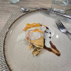 A vegetable crepe with edible flowers