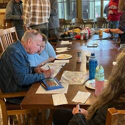Steve and Carmen working on the coloring book