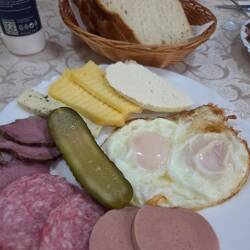 Breakfast at Casa Codrilor for 50 lei each. Eggs, cheese and meat from the dad's farm