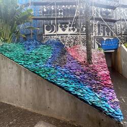 An art installation at Potato Head made up of coloured thongs