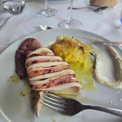 My lunch was grilled red squid with potatoes and aoili .