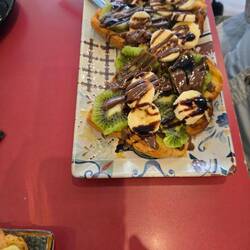 Phil had banana, kiwi, Nutella chocolate toast and coffee.