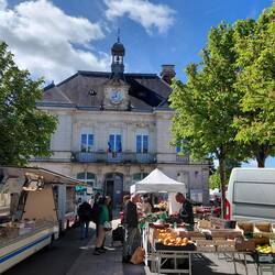 The local market, outside the Cite de Ville (Shire Hall) in Aigre