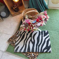 Funky doormats and dry flowers for sale