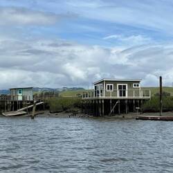 A couple of buildings along the river