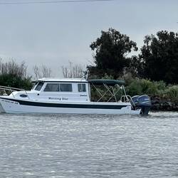 Morning Star departing Wheeler Island Duck Club
