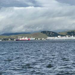 USCG cutter and some old Navy Ships along the way
