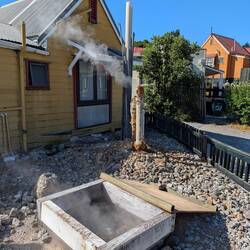 These are communal cooking pits - just drop the food in, close the top, and let it steam