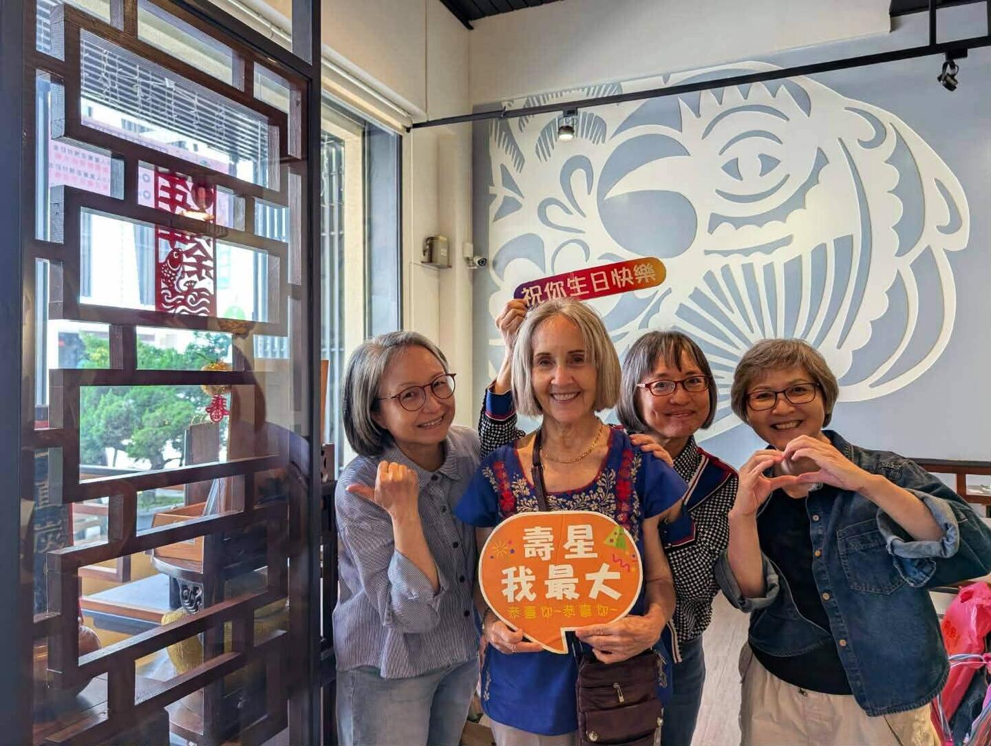 "Happy Birthday" is basically what the signs say