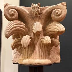 Wolf biting fruit, 11th century