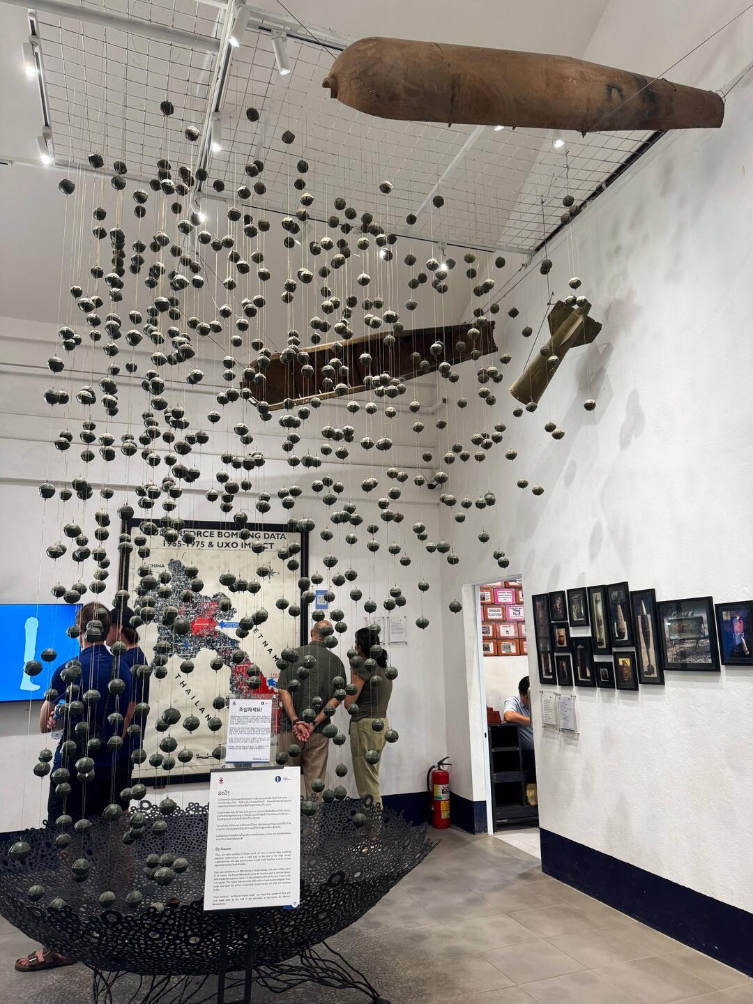The first thing you see: a powerful representation of cluster bombs - bombies - falling to earth.