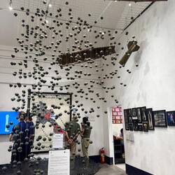 The first thing you see: a powerful representation of cluster bombs - bombies - falling to earth.