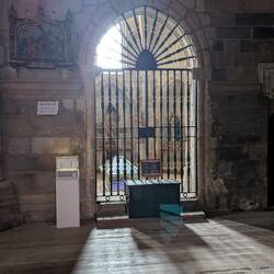 Church of Santa María de la Asunción. Glass protecting a sculpture