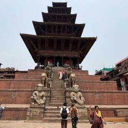 The four of us on the steps of a Hindu temple