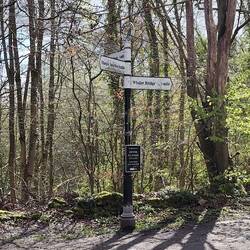 Sign near the head of the canal pointing to its twin termini at Bugsworth & Whaley Bridge