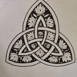 A double Celtic Triquetra with flowery filling