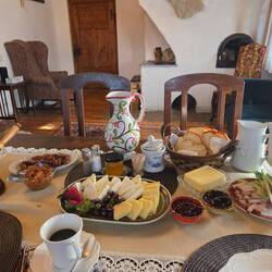 Breakfast at Hai La Saivan. It's bacon lard on the plate with spring onions and cucumber.