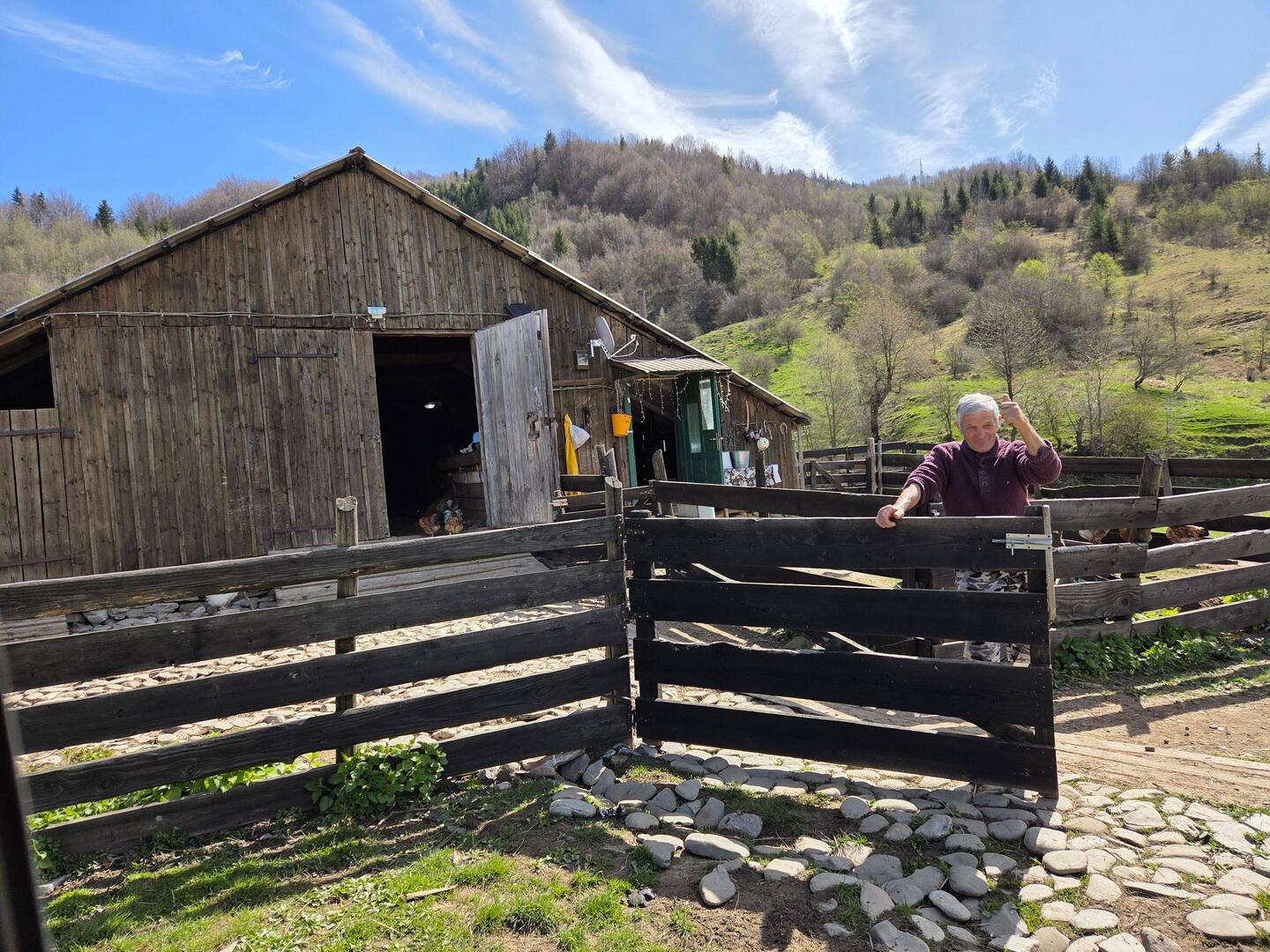 Farmer PaPa who lives on the farm behind green door where he has bed, kitchen and bathroom.