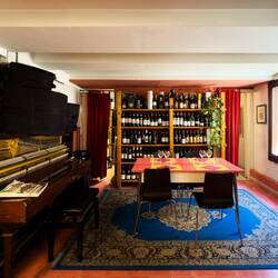 Part of the dining room at La Risorta Osteria del Re Fosco — Padova, Italy.