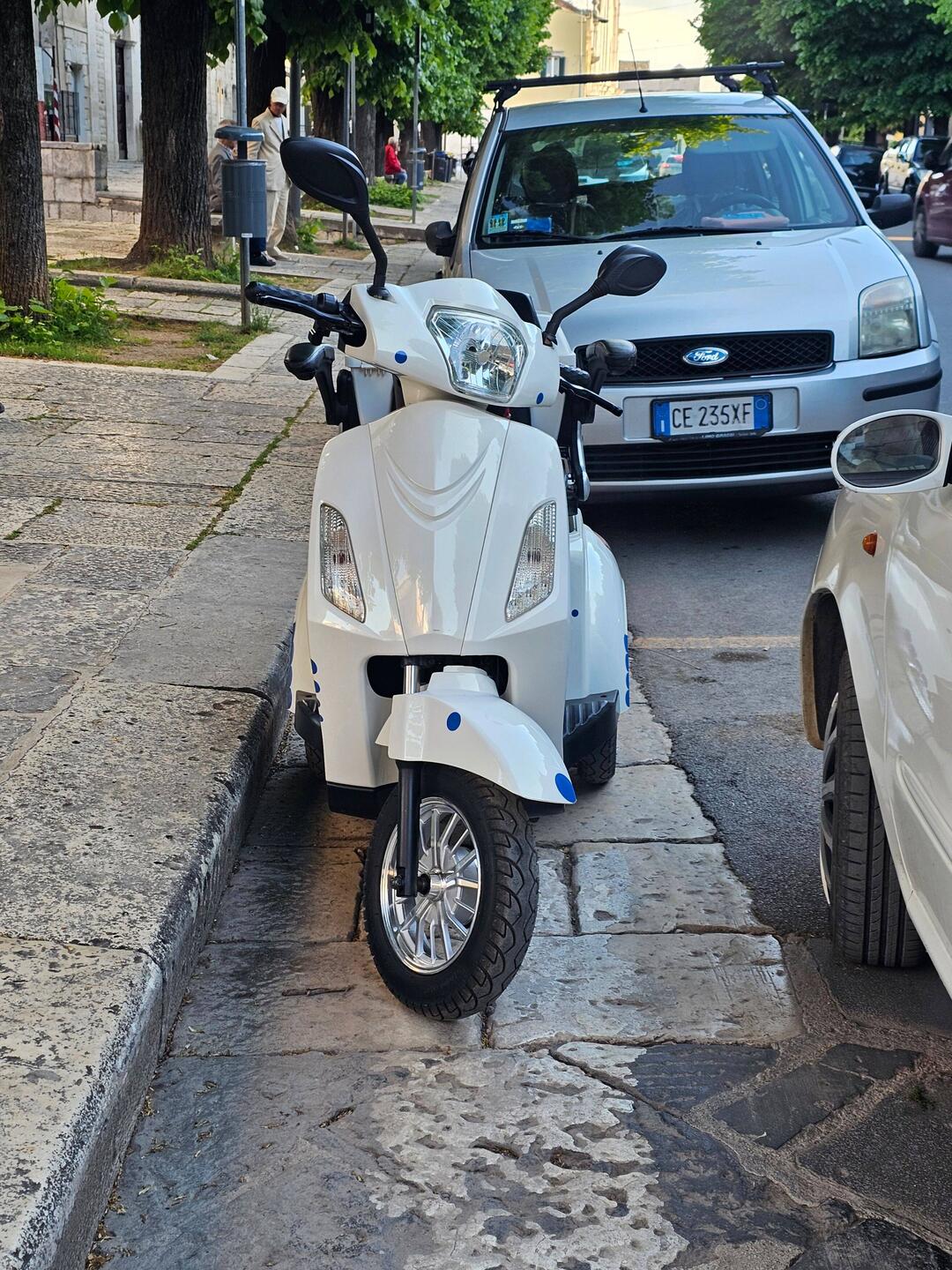 A three wheeled vespa?