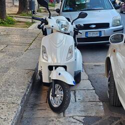 A three wheeled vespa?