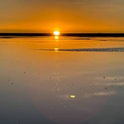 Sun setting along the salt flats.