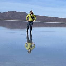 The world's largest mirror reflecting Melissa's image.