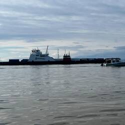 Large tug passing Mystery Girl.