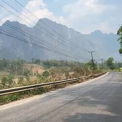 An impressive high rock mountain ridge accompanied us into Lak Sao.