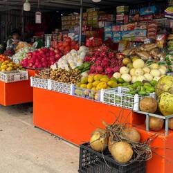 I never tire of the colours of a fruit stall. This one in Lak Sao.