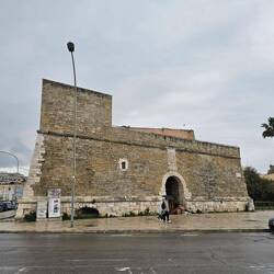 The city walls face the sea