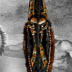 Wooden mask w/carved crocs and bird; surrounded by plant fibers and cowrie shells — Eastern Sepik.