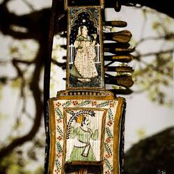Sound box: hollow wood covered w/leather; neck decorated w/engraved bone (from Afghanistan).