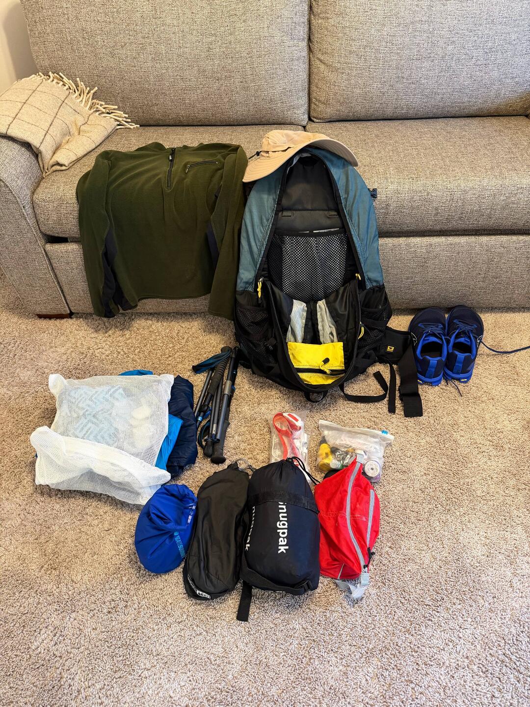 Under 9 pounds without good and water but with the hiking poles!