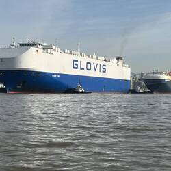 Tugs assisting a RORO at docking