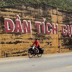 A large mural notes a civic duty "All people actively participate in protecting national security"