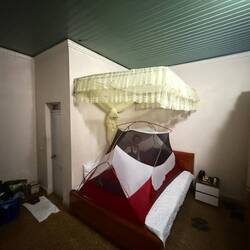 Our room was musty, dank, full of holes and mosquito ridden. Hence the tent
