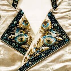 Detail from an embroidered silk satin gentleman's waistcoat; from Venice (18th-19th century).