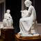 I love the way these two sculptures were placed like the woman on the left is drawing the other one.
