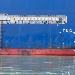 Same ship. You can see the pilot boarding ladder and tug markings.