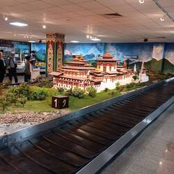 Replica of a Bhutan palace on a baggage carousel at Paro, Bhutan