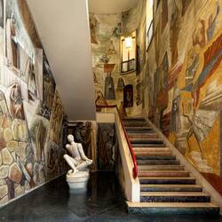 Hall of Heroes: "Palinuro" by A. Martini & Staircase to Knowledge" — Palazzo del Bo.