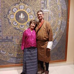 Anna in her kira for the evening. Me in my gho.  Bhutan national dress.