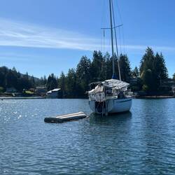 I think this guy's dinghy is upside down...