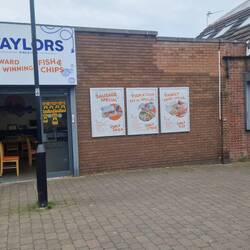 We got fish and chips from the Click and Collect window at Taylors (on the right).