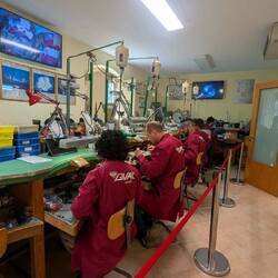 Workers creating jewelry
