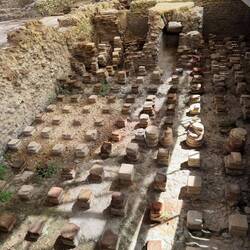 False Floor Under Roman Bath Heated Water