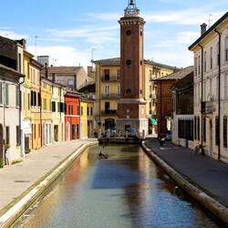 Torre Civica from a different side of the canal — Comacchio, Italy.